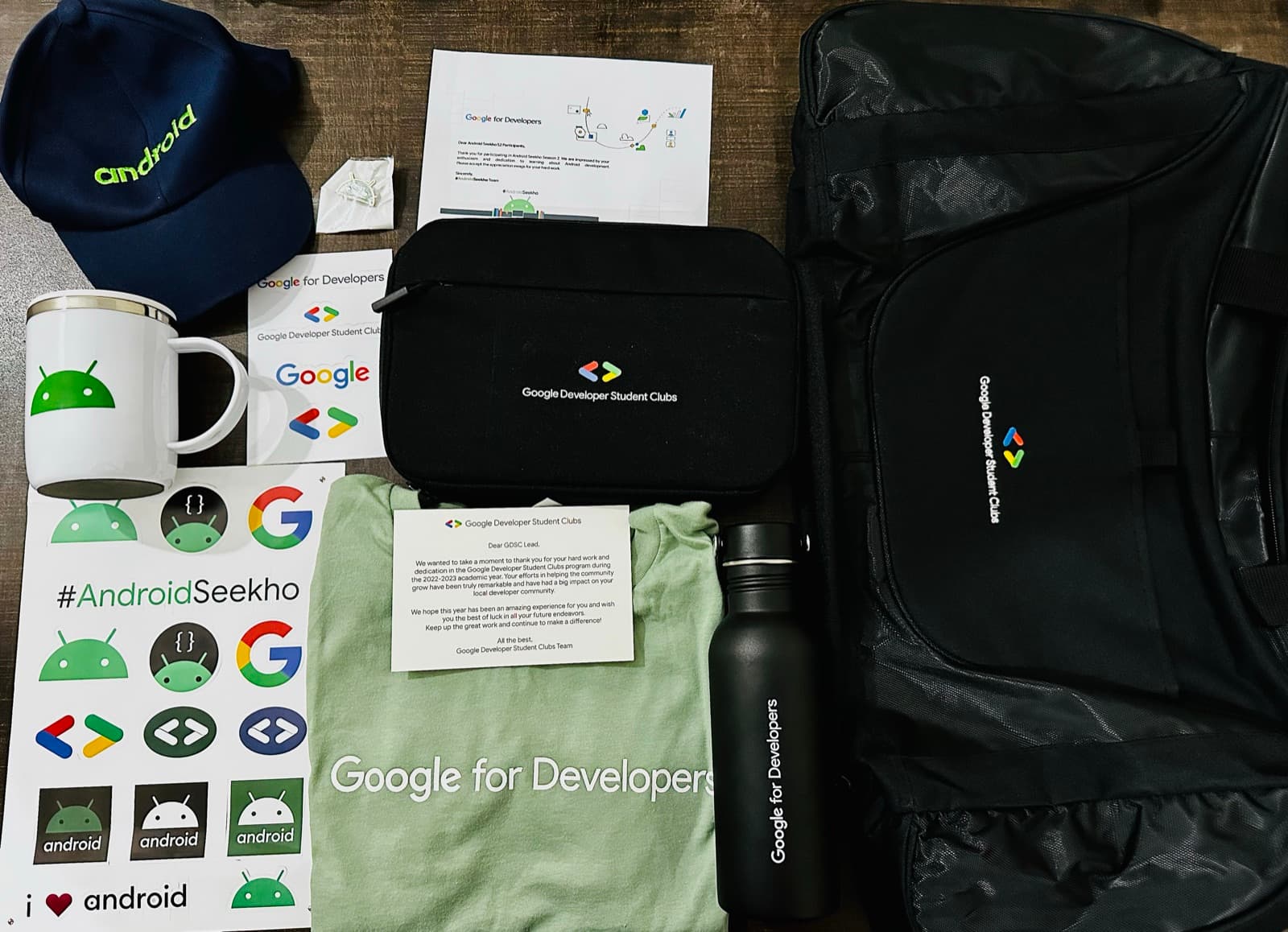 Google Developer Student Clubs lead swag including bags, shirt, mug and stickers